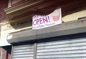 Pound Cake Heaven's Now Open sign at 5029 Baltimore Avenue (Photo by Annamarya Scaccia / West Philly Local)