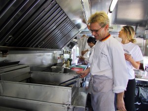 Chef Stirling Sowerby cooking on the line (Photo